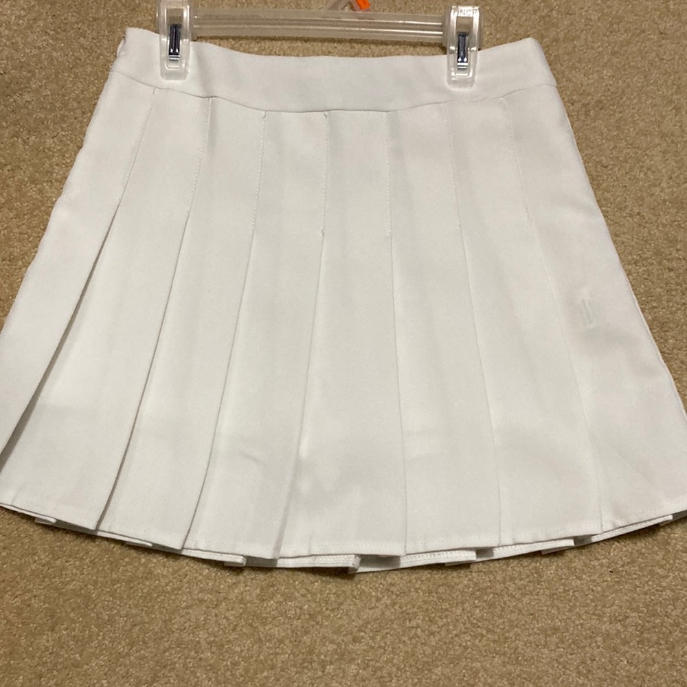 white pleated mini skirt